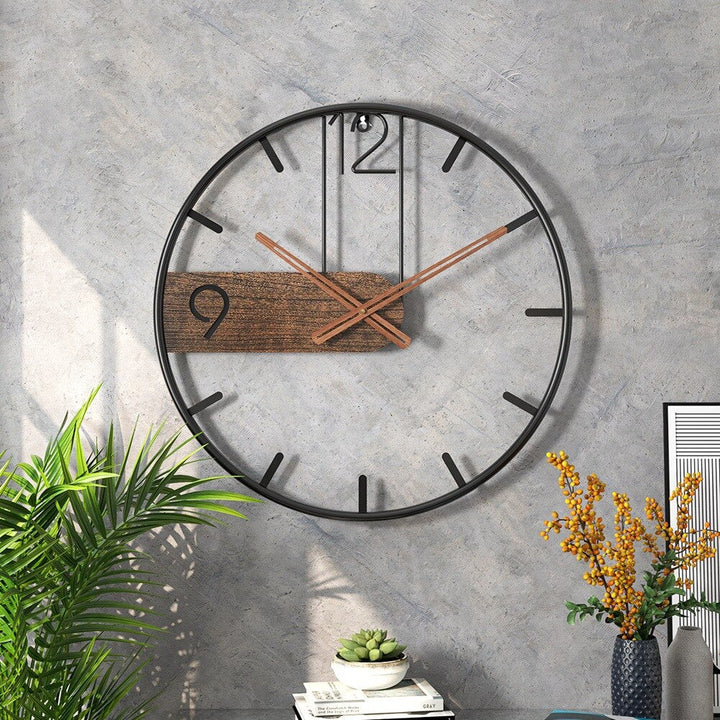 Elegant – Wanduhr aus Stahl und Walnuss